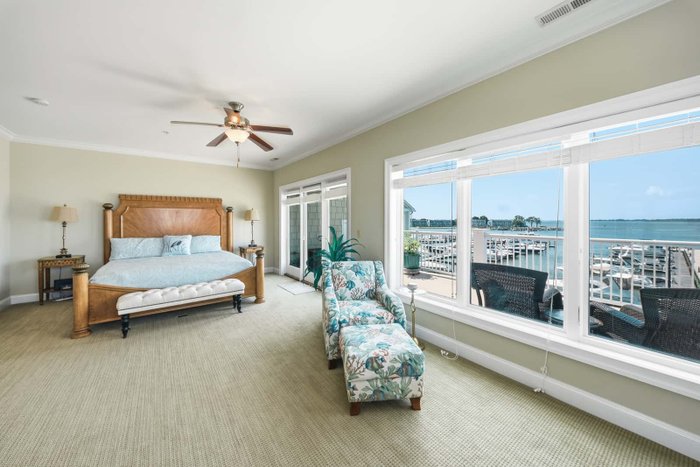 A bedroom with a harbor view edited by AutoHDR V3