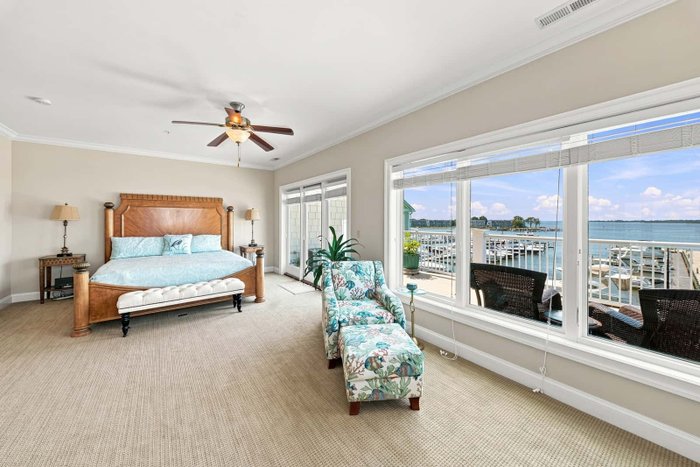 A bedroom with a harbor view edited by AutoHDR Iris